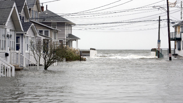 A street on the shoreline of Milford, Connecticut, floods at high tide as Hurricane Sandy approaches on Monday.