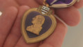 Soldier reunites families with medals