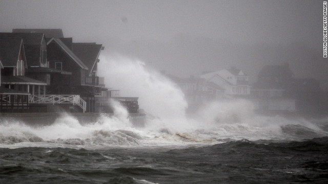 Waves slam into the sea wall in Scituate, Massachusetts, on Monday.