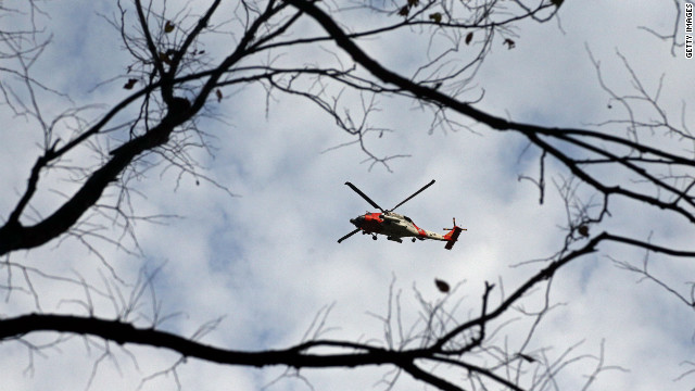 A U.S. Coast Guard helicopter flies over Central Park in New York City.