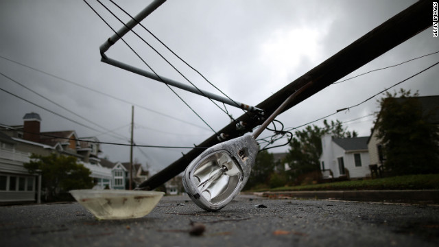 A street light and utility pole lie on the street in Avalon, New Jersey, on Tuesday.