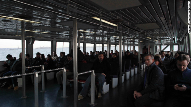 Commuters ride a NY Waterway ferry from Jersey City, New Jersey, on Wednesday, the first day of operation since the storm hit.