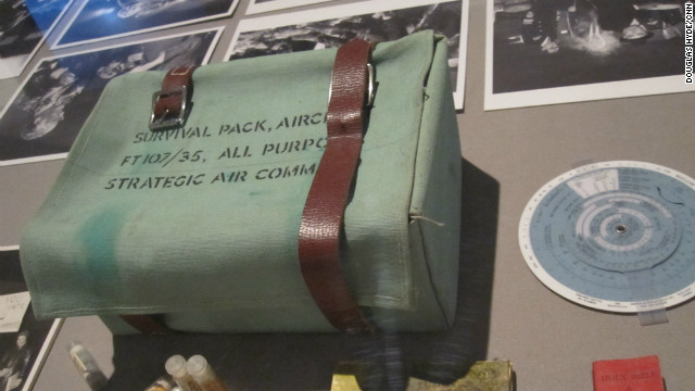 The survival kit issued to the bomber crew in "Dr. Strangelove." Note the teeny tiny red book containing not just the Holy Bible, but a useful list of Russian phrases as well.