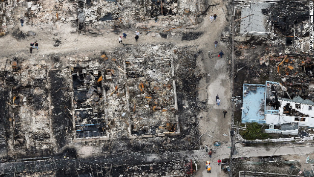 An overview of the fire damage in Queens, New York, following Hurricane Sandy. Residents in hard-hit areas sifted through the wreckage of Sandy on Wednesday as millions remained without power.