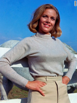 Pilot Pussy Galore, played by Honor Blackman, claimed to be immune to Bond's charm in 1964's "Goldfinger." However, Galore eventually falls for 007.