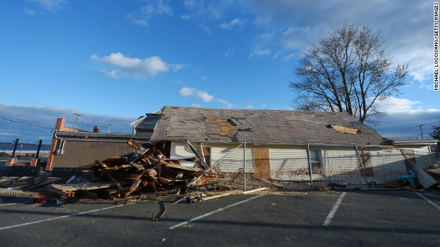 A house sits devastated by Superstorm Sandy on Friday, November 2, in Union Beach, New Jersey. The cost of the storm's damage in the U.S. is estimated at between $30 billion and $50 billion, according to disaster modeling firm Eqecat. 