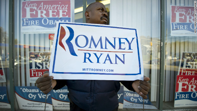 James Tate, 45, holds a sign in support of the Republican ticket in Pittsburgh, Pennsylvania. 