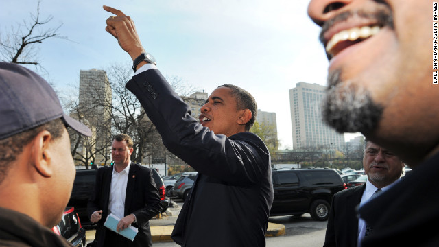 President Obama greets supporters outside a campaign office in Chicago Tuesday.