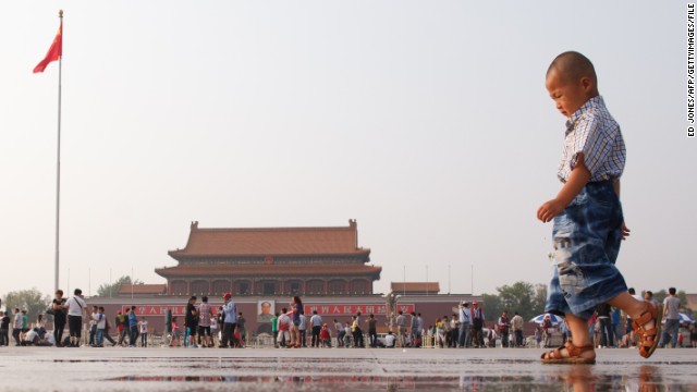 A young boy plays in Tiananmen Square in Beijing on June 3, 2012.