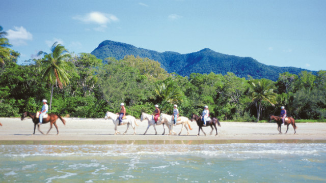 Australia is synonymous with gorgeous beaches, and plenty of visitors will be heading to the beaches around Cairns and Port Douglas to watch the solar eclipse. Those seeking an even more special experience can saddle up and take a horse riding tour along Wonga Beach.