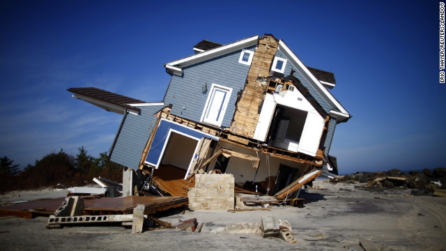 A home that was destroyed by Hurricane Sandy sits in ruin in Mantoloking, New Jersey, on November 12, 2012. There were 11 disaster events in 2012, each one causing more than $1 billion in damages, the <a href='http://www.ncdc.noaa.gov/news/ncdc-releases-2012-billion-dollar-weather-and-climate-disasters-information' target='_blank'>National Climatic Data Center</a> said. Sandy's costs are estimated to be the highest at about $65 billion in losses, the center said.