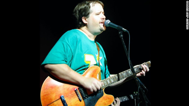 Steve Rummler playing guitar with his band, The Goonybirds, at a ski resort in 2002.