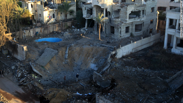 A crater is left at a spot targeted by an Israeli airstrike in Gaza City early Thursday, November 15.