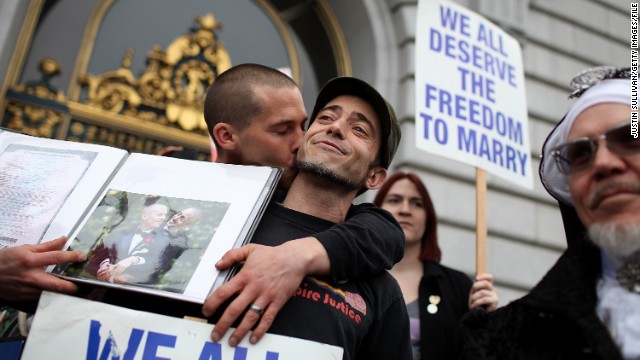 The U.S. Supreme Court is scheduled to hear two same-sex marriage cases next week. Above, Frank Capley-Alfano and Joe Capley-Alfano celebrate outside of San Francisco City Hall in February after a federal appeals court blocked the law.