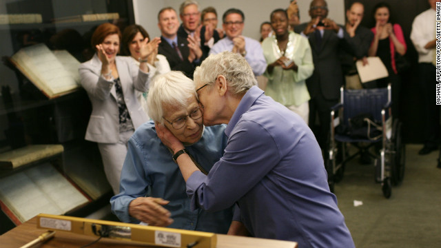 Phyllis Siegel, 76, kisses her wife, Connie Kopelov, 84, after exchanging vows at the Manhattan City Clerk's office last year. (Photo by Michael Appleton-Pool/Getty Images)