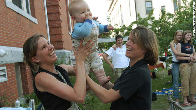 Lara Ramsey, left, and her partner of eight years, Jane Lohmann, play with their 7-month-old son, Wyatt Ramsey-Lohmann. The two wed in 2004 after Massachusetts approved same-sex marriage.