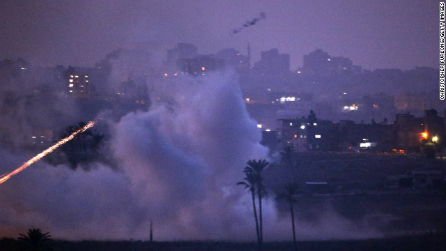 Israeli artillery shells hit a target in the Gaza Strip on Monday near Israel's border with the Gaza Strip. 