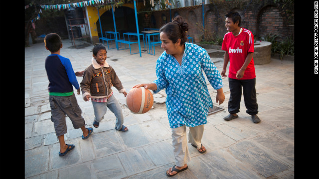 "The first thing you notice about Pushpa is her huge smile to welcome you," photographer Mohan said. "She's full of energy. She has this incredibly booming voice that never stops all day, all night."