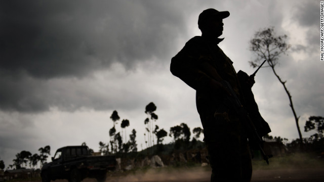 The crisis in Eastern Democratic Republic of the Congo escalates, as soldiers from the M23 enter the regional capital of Goma. Pictured is a M23 rebel standing guard in the village of Kanyarucinya, 6km from Goma on November 18, 2012.