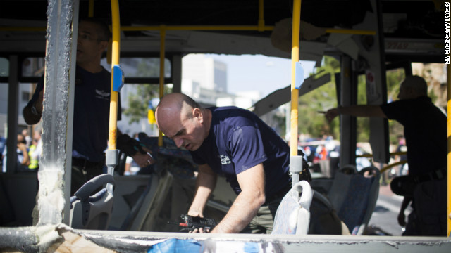 Emergency services at the scene of the explosion on a bus with passengers onboard.