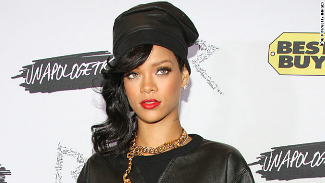 Rihanna, with a new No. 1, says sorry to plane press