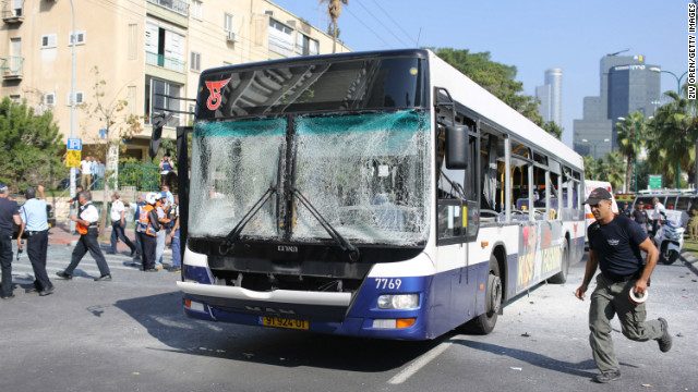 Emergency services rush to the scene of an explosion on November 21 in central Tel Aviv.