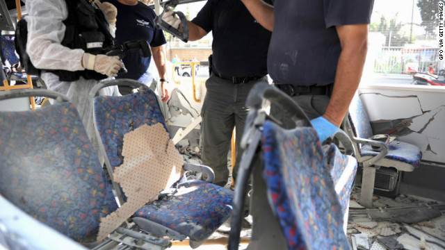 Emergency services attend the scene after a bus explosion in central Tel Aviv.