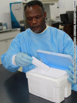 Dr. Anthony Ablordey handles a point-of-care test sample in a lab at the University of Ghana. The test aims to provide rapid and accurate detection of the Buruli ulcer disease in poor places.