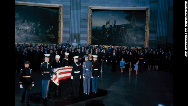 Kennedy's flag-draped casket lies in state in Washington.