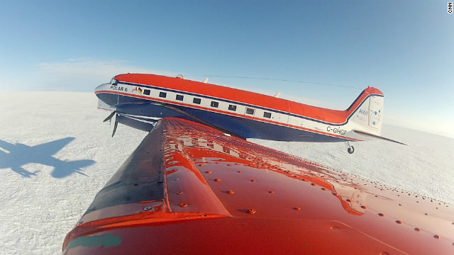 POLAR 6 takes off from the Greenland ice shield after a successful ice-core drilling mission.