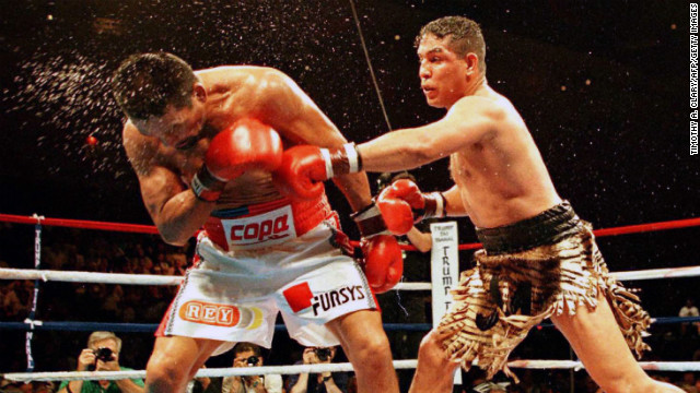 Camacho lands a punch to his opponent, Roberto Duran, during their IBC middleweight fight in Atlantic City, New Jersey, in 1996. Camacho won in a 12-round decision.