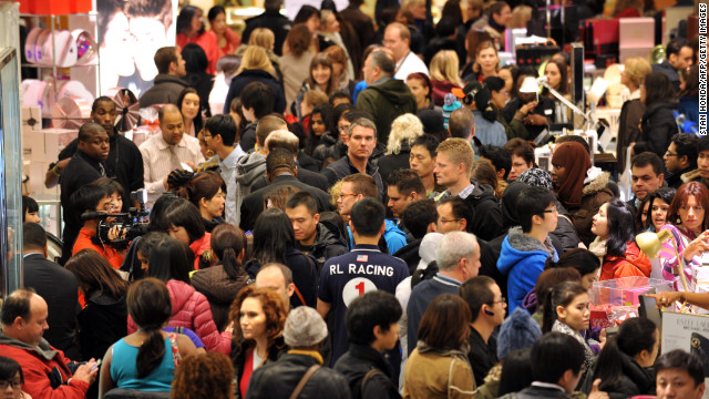 Shoppers crowd a Macy's in New York for the store's Black Friday sale on November 23, 2012. Some stores opened even earlier, cutting into the Thanksgiving celebrations and indicating that even this cherished American family holiday is falling prey to the forces of commerce.