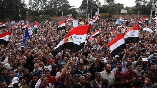 Morsy supporters gather outside the presidential palace in Cairo on Friday. Morsy insisted that Egypt was on the path to "freedom and democracy" as protesters held rival rallies over sweeping powers he assumed that further polarized the country's political forces.