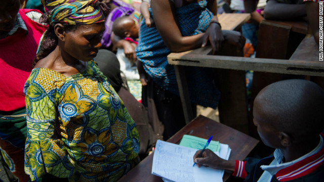 A displaced Congolese woman registers at a camp for displaced persons at Mugunga, 8km from the centre of Goma on November 22, 2012.