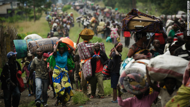 The violence drove tens of thousands of Congolese from their homes. Here on November 22 2012, thousands fled the town of Sake and headed east to the camps for displaced in the village of Mugunga.