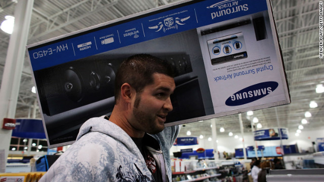 A shopper scores a Samsung sound bar at a Best Buy store in Naples, Florida.