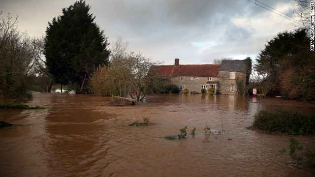 England flooding kills 1, more rain on way