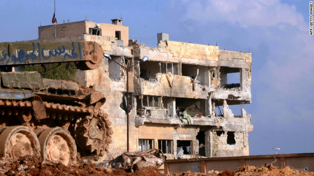 The scars of war -- damage is readily visible at a government-controlled building in al-Layramun district of Aleppo on Monday, November 26.