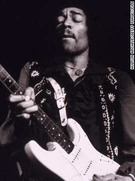 With the release of albums "Axis: Bold as Love" and "Electric Ladyland" in 1968, Hendrix, as seen here performing in the late '60s, was turning into a larger-than-life rock musician. 