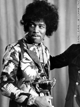 Seen here in October 1967, Hendrix receives an award from Radio One DJ Jimmy Savile. The Experience's first single, "Hey Joe," was released that year and was a phenomenal hit in the U.K. Another smash, "Purple Haze," and the group's double-platinum first album "Are You Experienced?" soon followed.