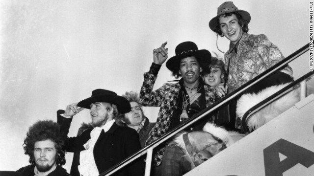 Here, Jimi Hendrix and drummer Mitch Mitchell board a plane in London in 1968, along with various members of the Byrds, the Soft Machine and the Alan Price Set. The Experience disbanded in 1969, but that same year Hendrix gave a memorable performance at Woodstock.