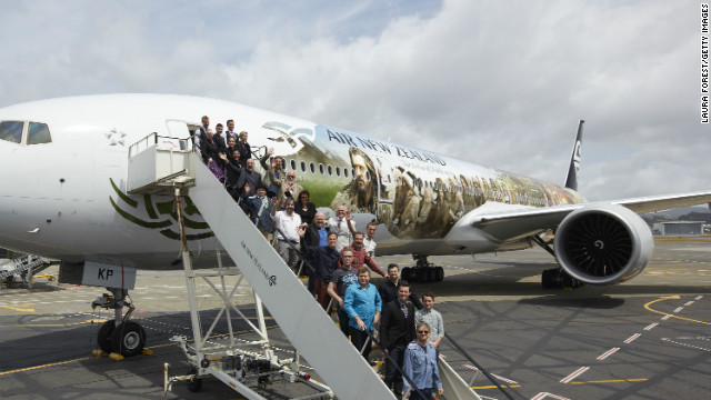 The cast of "The Hobbit" pose with an Air New Zealand Hobbit-inspired jet after arriving in Wellington.