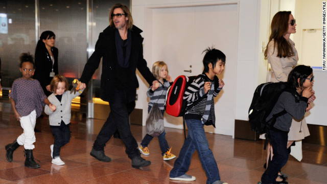 Every so often, photographers will catch the entire Jolie-Pitt clan all at once, which is what happened here as the family arrives at the Haneda Airport in Tokyo in November 2011. They were in town to promote Pitt's film "Moneyball," which earned him another Oscar nod, his third for acting.