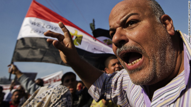 A man shouts as protesters gather in Tahrir Square on November 30.