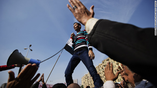 An Egyptian man delivers a speech as protesters gather in Cairo's Tahrir Square on Friday, November 30.