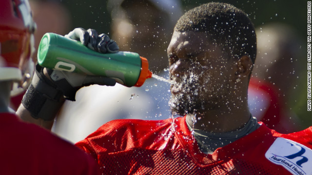 Belcher cools off from temperatures over 100 degrees during a training camp practice on the campus of Missouri Western State University in St. Joseph, Missouri, on August 1, 2011. 