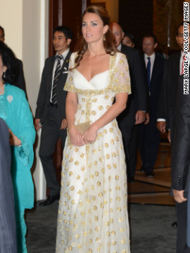 The duchess donned a white and gold gown by Alexander McQueen for a dinner hosted by Malaysia's head of state on September 13.