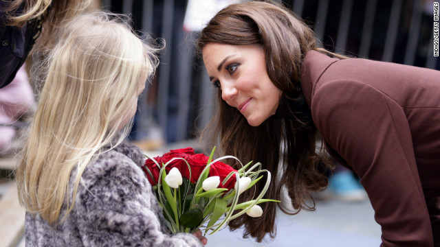 Catherine talks with a young girl as she arrives for a visit to Alder Hey Children's Hospital on February 14, 2012, in Liverpool, England.