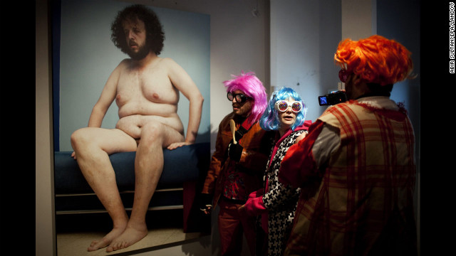 February 20: Israeli students wearing costumes visit an art exhibition in downtown Jerusalem. The special cultural project aimed to draw people out in spite of the cold weather to enjoy art in a party atmosphere.