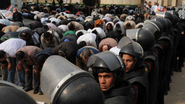 Supporters of Morsy pray outside the Supreme Constitutional Court on December 2.